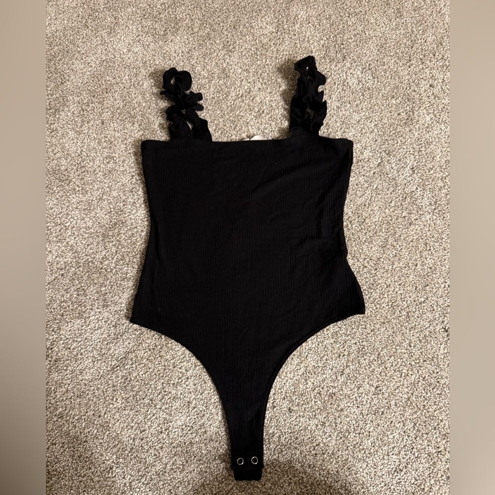 Black ruffle strap bodysuit